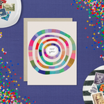 Congratulations greeting card with colorful concentric circles around the text 'yay you'