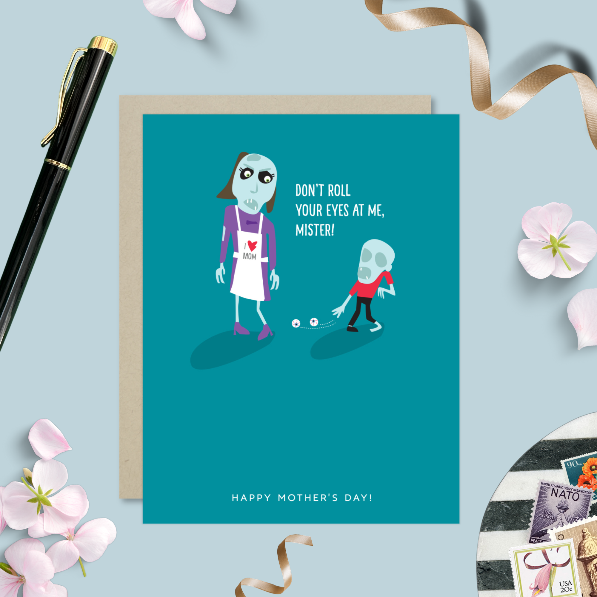 Mothers day greeting card with 2 zombies, one's eyes on the floor text 'don't roll your eyes at me, mister..happy mothers day'